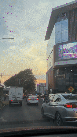 Traffic stops during sunset in Puebla, Mexico