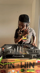 DJ performs with Pioneer mixer in London indoor venue