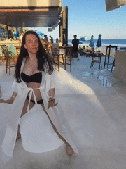 Women dance at beachfront resort in Kuta Selatan