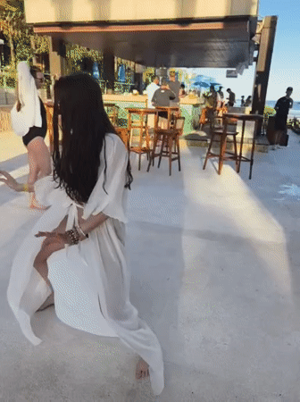 Women dance at beachfront resort in Kuta Selatan