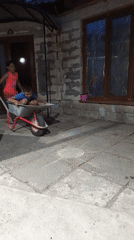 Wheelbarrow rides and home preserves in a Tiraspol courtyard