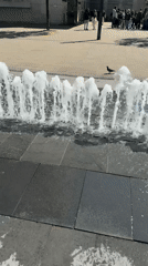 Fountain operates in sunny Budapest plaza