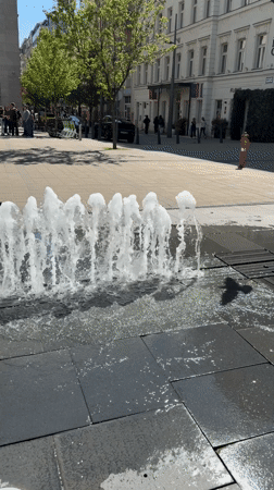 Fountain operates in sunny Budapest plaza