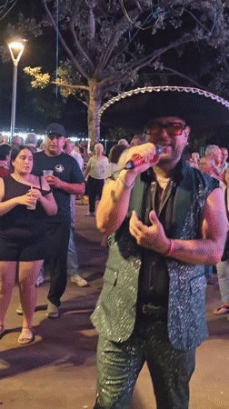 Nighttime outdoor concert features two musicians in Cornellà de Llobregat
