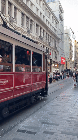 Golden hour on İstiklal: trams, cats, and Galata Tower