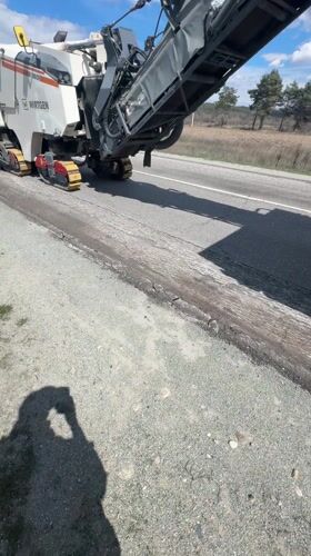 Road maintenance machine operates in Zlokuchene, Bulgaria