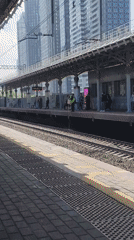 Man in vest pours liquid onto Moscow train tracks