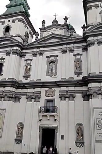 Daily life documented around baroque church in Ternopil, Ukraine