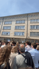 Large crowd gathers outside institutional building in Burgas, Bulgaria