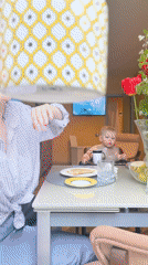 Mother and baby share early morning meal in Khimki