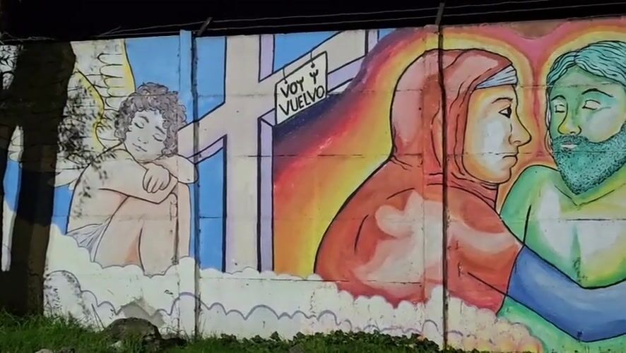 Nighttime street mural documented in Osorno, Chile