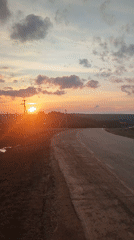 Sunset documented along rural road in Sarapul, Russia