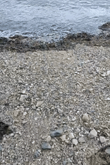 Magadan waterfront: rocky shore, public art, and local market