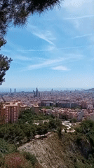 Witness captures daytime panoramic view of Barcelona cityscape