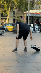 Skateboarders gather in Barcelona plaza during sunny evening session