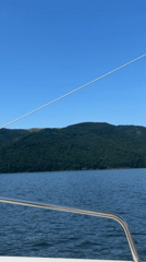 Boat ride on calm Bulgarian waters beneath a clear summer sky