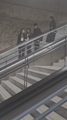 Escalator and staircase captured in modern public building