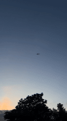 Aircraft and paraglider activities observed in London evening sky