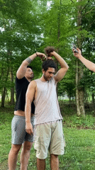 Late-night outdoor haircut session in Washington Township woods
