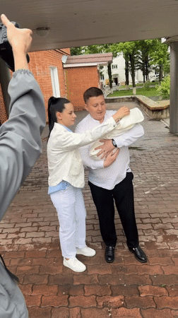 Family photoshoot captured near hospital in rainy Birobidzhan