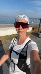 Woman records selfie video in athletic gear in Fethiye