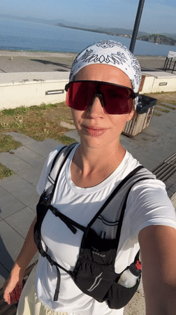 Woman records selfie video in athletic gear in Fethiye