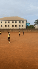 Soccer match on dirt field in Barakin Lerawi