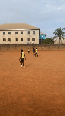 Soccer match on dirt field in Barakin Lerawi