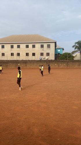 Soccer match on dirt field in Barakin Lerawi