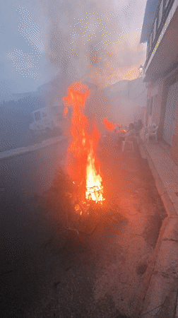 Bonfire burns in Fontanarejo, Spain outdoor scene