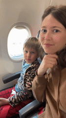 Mother and child travel through Istanbul Airport via Turkish Airlines