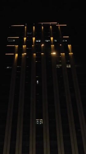 Nighttime urban scenes documented across Yuzhong District commercial area
