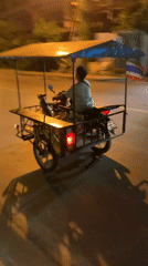Nighttime tuk-tuk ride through Bang Rak streets