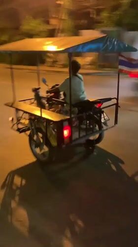 Nighttime tuk-tuk ride through Bang Rak streets