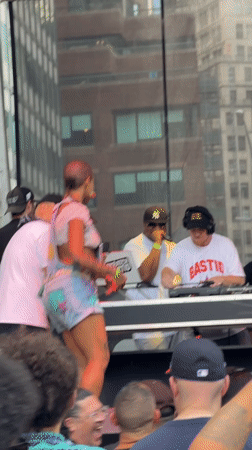 Live outdoor concert in New York with dancing performer and DJs