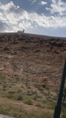 Fortress wall and tower documented on Marrakesh hillside
