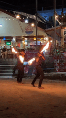 Fire dancers perform coordinated show on Karon Beach