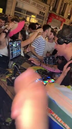 Outdoor DJ set and dancing crowd on Fête de la Musique night