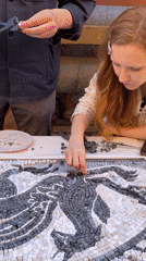 Crowd gathers for outdoor mosaic art project in Saint Petersburg