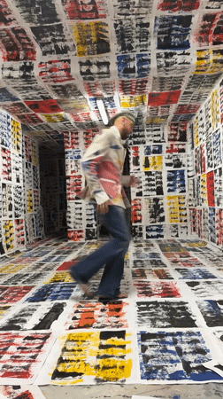 Man dances in paper-covered art installation in Toulon