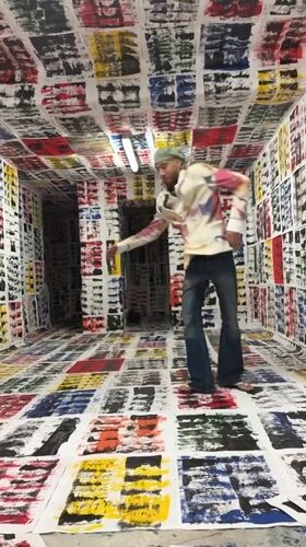 Man dances in paper-covered art installation in Toulon