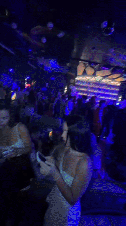 Nightclub scene captured in Si Sunthon features karaoke, socializing