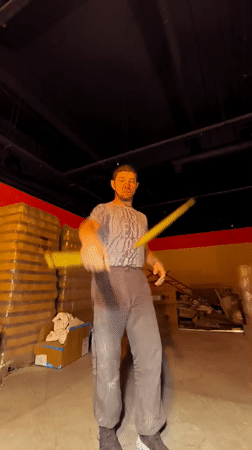 Skill performers rehearse in a Kazakhstani warehouse