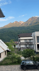 Mountain landscapes and parked SUV observed in Krasnaya Polyana