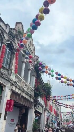 Longhua District's lantern-lit colonial street on a cloudy morning