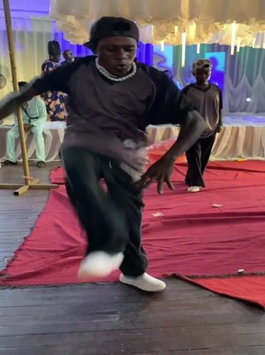 Dance crew hits the red carpet at a Nigeria wedding reception