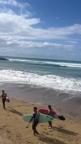 Beach surfing activity documented in Las Palmas, Spain