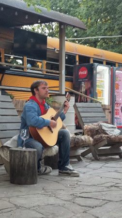 Street musician performs acoustic set in Shakhty, Russia