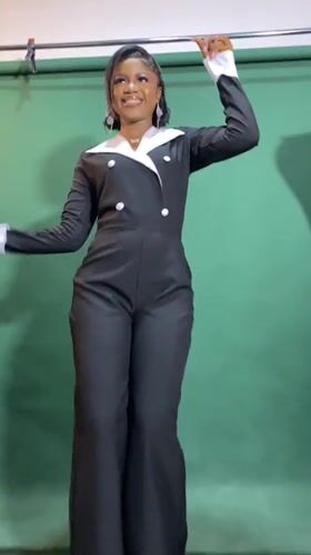 Woman conducts professional photo shoot in Jos studio