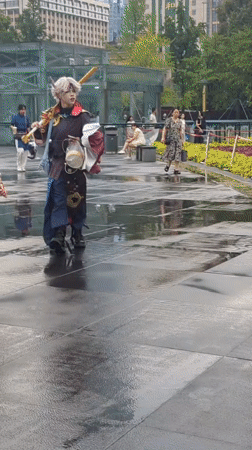 Cosplayers and ancient artifacts collide in rainy Chengdu